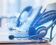 Affiliated Blog close up soft focus on headset with telephone devices at office desk for customer service support